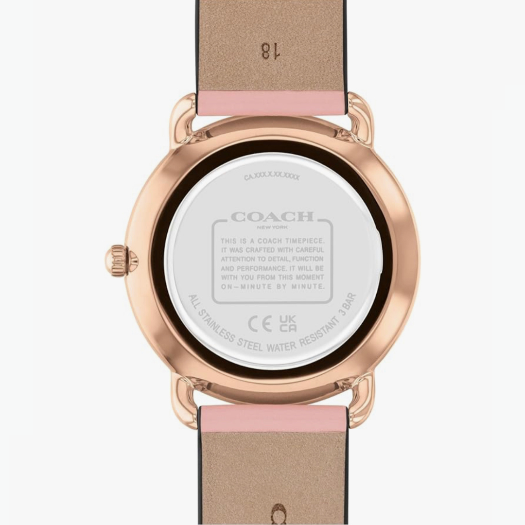 Coach Rose Gold Tone Watch With Fashionable Charms in The Dial and a Light Pink Leather Strap